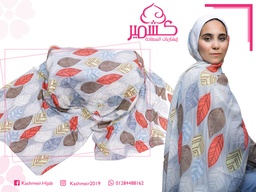 Scarf with colorful tree leaves on a gray background