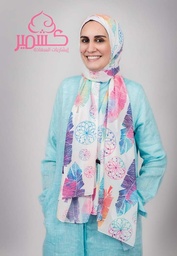 Scarf patterned with turquoise, mauve, and fuchsia colors.